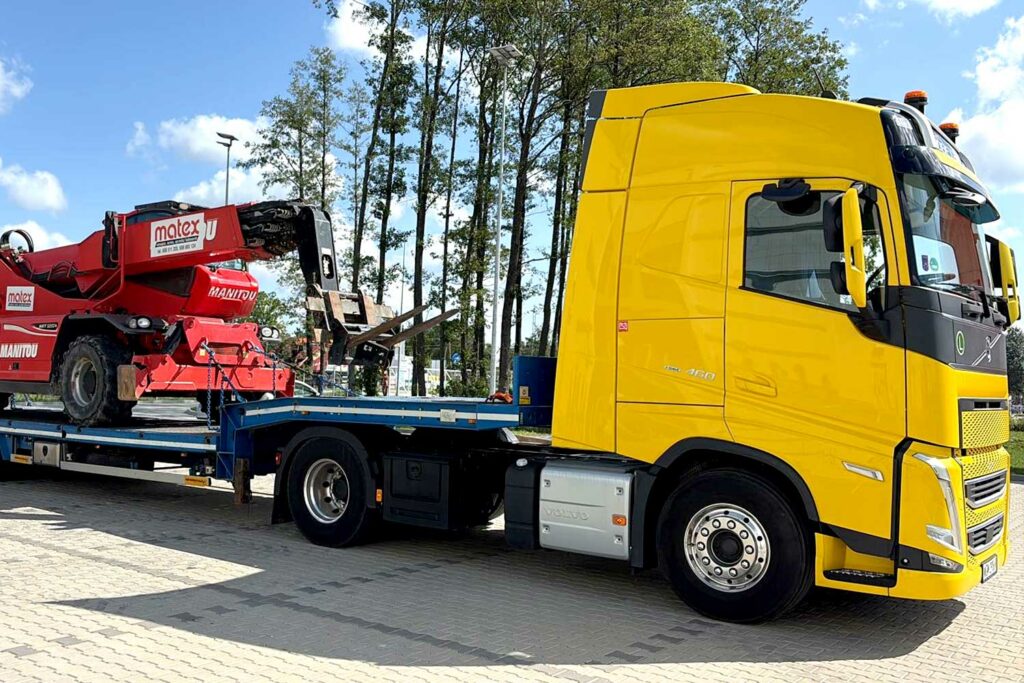 2026-09-25_ładowarka_16_transport