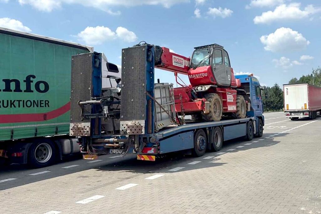 2026-09-25_ładowarka_24_transport