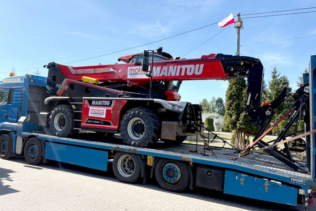 2026-09-25_ładowarka_32_transport